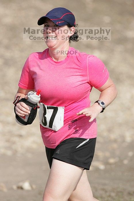 Meredith Cohen running the Army Dillo half-marathon and 32K race.

Filename: SRM_20080921_1001066.jpg
Aperture: f/4.0
Shutter Speed: 1/2000
Body: Canon EOS-1D Mark II
Lens: Canon EF 300mm f/2.8 L IS