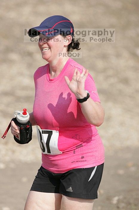 Meredith Cohen running the Army Dillo half-marathon and 32K race.

Filename: SRM_20080921_1001067.jpg
Aperture: f/4.0
Shutter Speed: 1/2000
Body: Canon EOS-1D Mark II
Lens: Canon EF 300mm f/2.8 L IS