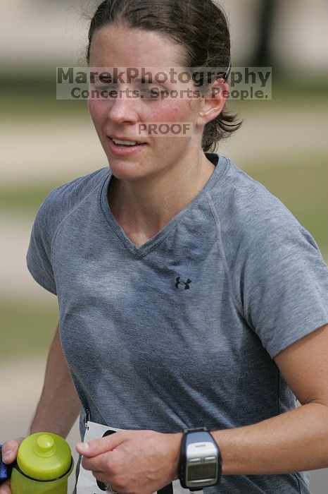 Beth Marek won first place in her age division at the Army Dillo half-marathon and 32K race.

Filename: SRM_20080921_1044582.jpg
Aperture: f/4.0
Shutter Speed: 1/2000
Body: Canon EOS-1D Mark II
Lens: Canon EF 300mm f/2.8 L IS