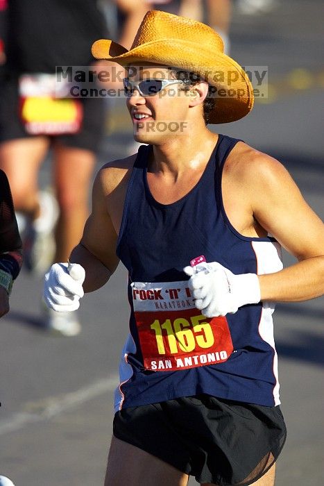 The first annual San Antonio Rock and Roll Marathon, Sunday, November 16, 2008.

Filename: SRM_20081116_08472405.jpg
Aperture: f/4.0
Shutter Speed: 1/2000
Body: Canon EOS-1D Mark II
Lens: Canon EF 300mm f/2.8 L IS