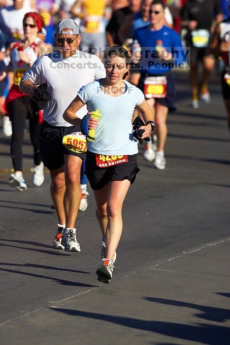 Beth Marek, bib #4236, completed the course in 3:38:21, a Boston Marathon qualifying time.  The first annual San Antonio Rock and Roll Marathon, Sunday, November 16, 2008.

Filename: SRM_20081116_08515811.jpg
Aperture: f/4.0
Shutter Speed: 1/3200
Body: Canon EOS-1D Mark II
Lens: Canon EF 300mm f/2.8 L IS