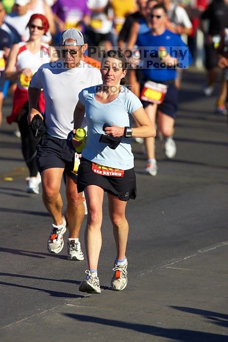 Beth Marek, bib #4236, completed the course in 3:38:21, a Boston Marathon qualifying time.  The first annual San Antonio Rock and Roll Marathon, Sunday, November 16, 2008.

Filename: SRM_20081116_08515812.jpg
Aperture: f/4.0
Shutter Speed: 1/3200
Body: Canon EOS-1D Mark II
Lens: Canon EF 300mm f/2.8 L IS