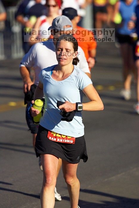 Beth Marek, bib #4236, completed the course in 3:38:21, a Boston Marathon qualifying time.  The first annual San Antonio Rock and Roll Marathon, Sunday, November 16, 2008.

Filename: SRM_20081116_08520621.jpg
Aperture: f/4.0
Shutter Speed: 1/3200
Body: Canon EOS-1D Mark II
Lens: Canon EF 300mm f/2.8 L IS