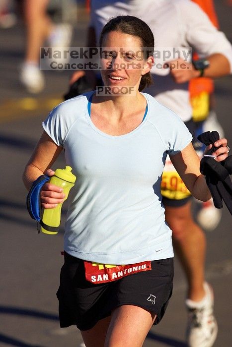 Beth Marek, bib #4236, completed the course in 3:38:21, a Boston Marathon qualifying time.  The first annual San Antonio Rock and Roll Marathon, Sunday, November 16, 2008.

Filename: SRM_20081116_08521024.jpg
Aperture: f/4.0
Shutter Speed: 1/3200
Body: Canon EOS-1D Mark II
Lens: Canon EF 300mm f/2.8 L IS