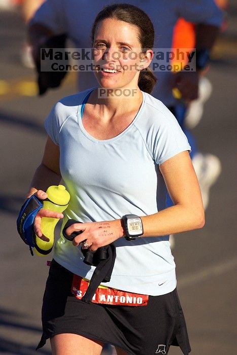 Beth Marek, bib #4236, completed the course in 3:38:21, a Boston Marathon qualifying time.  The first annual San Antonio Rock and Roll Marathon, Sunday, November 16, 2008.

Filename: SRM_20081116_08521226.jpg
Aperture: f/4.0
Shutter Speed: 1/3200
Body: Canon EOS-1D Mark II
Lens: Canon EF 300mm f/2.8 L IS