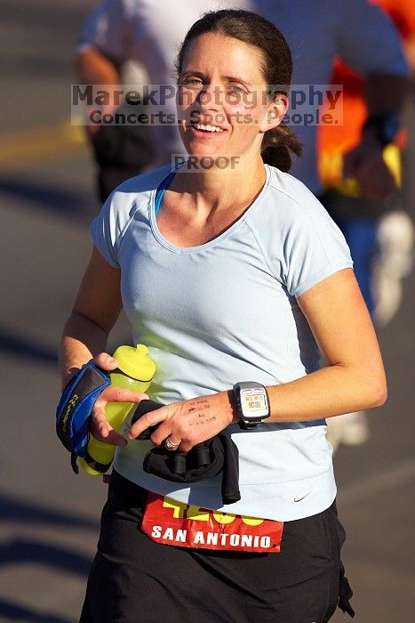 Beth Marek, bib #4236, completed the course in 3:38:21, a Boston Marathon qualifying time.  The first annual San Antonio Rock and Roll Marathon, Sunday, November 16, 2008.

Filename: SRM_20081116_08521227.jpg
Aperture: f/4.0
Shutter Speed: 1/3200
Body: Canon EOS-1D Mark II
Lens: Canon EF 300mm f/2.8 L IS