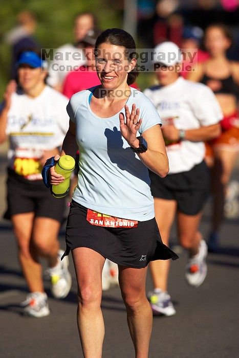 Beth Marek, bib #4236, completed the course in 3:38:21, a Boston Marathon qualifying time.  The first annual San Antonio Rock and Roll Marathon, Sunday, November 16, 2008.

Filename: SRM_20081116_09063838.jpg
Aperture: f/4.0
Shutter Speed: 1/4000
Body: Canon EOS-1D Mark II
Lens: Canon EF 300mm f/2.8 L IS