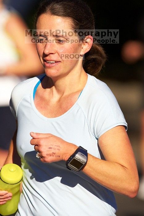 Beth Marek, bib #4236, completed the course in 3:38:21, a Boston Marathon qualifying time.  The first annual San Antonio Rock and Roll Marathon, Sunday, November 16, 2008.

Filename: SRM_20081116_09065053.jpg
Aperture: f/4.0
Shutter Speed: 1/3200
Body: Canon EOS-1D Mark II
Lens: Canon EF 300mm f/2.8 L IS