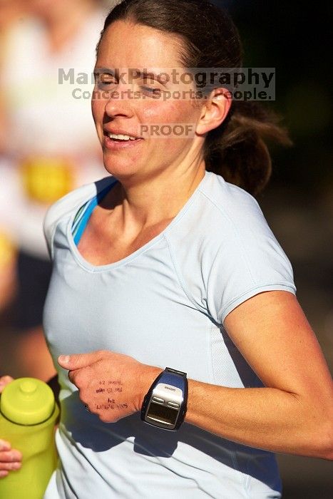 Beth Marek, bib #4236, completed the course in 3:38:21, a Boston Marathon qualifying time.  The first annual San Antonio Rock and Roll Marathon, Sunday, November 16, 2008.

Filename: SRM_20081116_09065254.jpg
Aperture: f/4.0
Shutter Speed: 1/4000
Body: Canon EOS-1D Mark II
Lens: Canon EF 300mm f/2.8 L IS