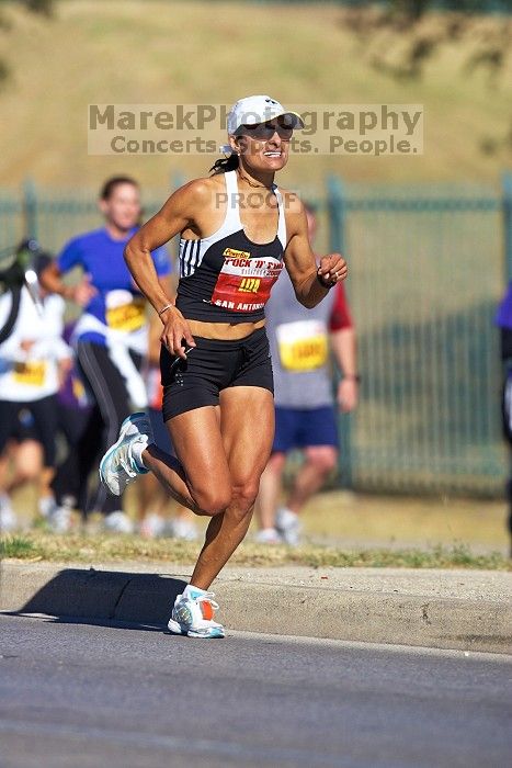 The first annual San Antonio Rock and Roll Marathon, Sunday, November 16, 2008.

Filename: SRM_20081116_10043226.jpg
Aperture: f/4.0
Shutter Speed: 1/2500
Body: Canon EOS-1D Mark II
Lens: Canon EF 300mm f/2.8 L IS