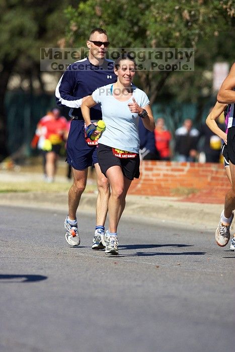 Beth Marek, bib #4236, completed the course in 3:38:21, a Boston Marathon qualifying time.  The first annual San Antonio Rock and Roll Marathon, Sunday, November 16, 2008.

Filename: SRM_20081116_11152245.jpg
Aperture: f/4.0
Shutter Speed: 1/2500
Body: Canon EOS-1D Mark II
Lens: Canon EF 300mm f/2.8 L IS