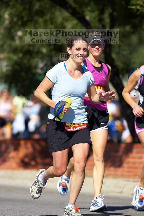 Beth Marek, bib #4236, completed the course in 3:38:21, a Boston Marathon qualifying time.  The first annual San Antonio Rock and Roll Marathon, Sunday, November 16, 2008.

Filename: SRM_20081116_11153254.jpg
Aperture: f/4.0
Shutter Speed: 1/2500
Body: Canon EOS-1D Mark II
Lens: Canon EF 300mm f/2.8 L IS