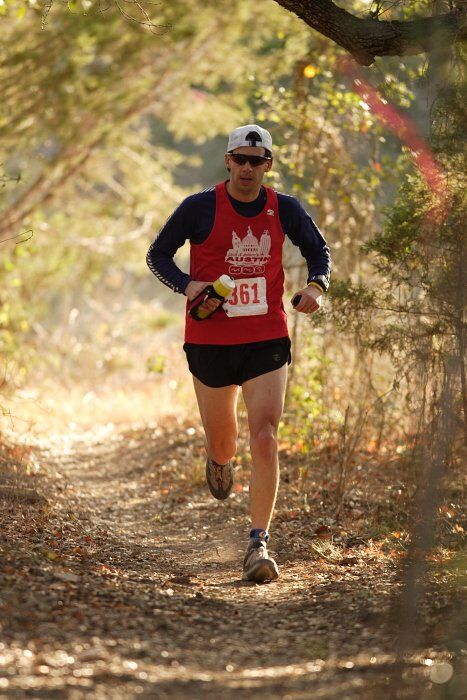 Paul Terranova placed first in his age group, fourth overall in the 25K at the Bandera 25K, 50K, and 100K trail race in Bandera, TX on Saturday, January 10, 2009.

Filename: SRM_20090110_09021239.jpg
Aperture: f/2.8
Shutter Speed: 1/400
Body: Canon EOS-1D Mark II
Lens: Canon EF 300mm f/2.8 L IS