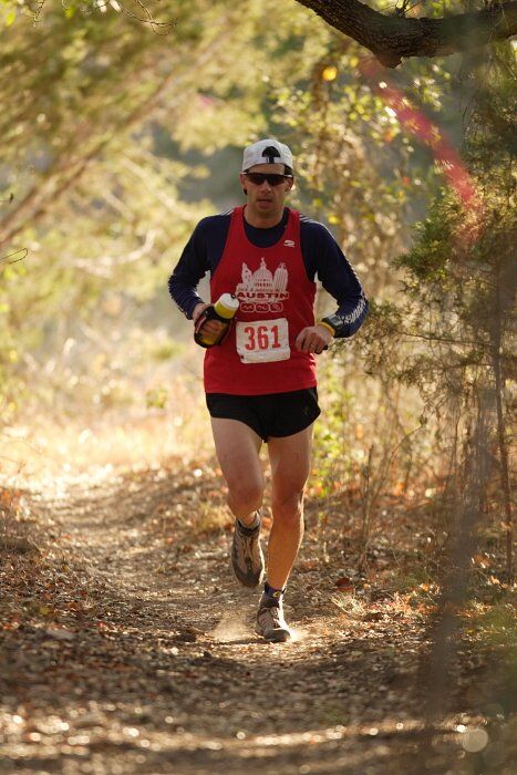 Paul Terranova placed first in his age group, fourth overall in the 25K at the Bandera 25K, 50K, and 100K trail race in Bandera, TX on Saturday, January 10, 2009.

Filename: SRM_20090110_09021440.jpg
Aperture: f/2.8
Shutter Speed: 1/400
Body: Canon EOS-1D Mark II
Lens: Canon EF 300mm f/2.8 L IS