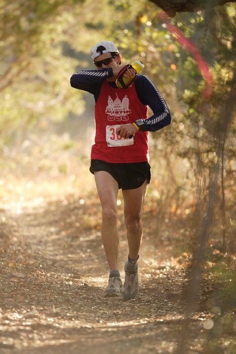 Paul Terranova placed first in his age group, fourth overall in the 25K at the Bandera 25K, 50K, and 100K trail race in Bandera, TX on Saturday, January 10, 2009.

Filename: SRM_20090110_09022444.jpg
Aperture: f/2.8
Shutter Speed: 1/400
Body: Canon EOS-1D Mark II
Lens: Canon EF 300mm f/2.8 L IS