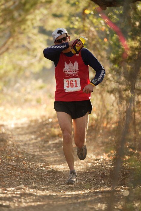 Paul Terranova placed first in his age group, fourth overall in the 25K at the Bandera 25K, 50K, and 100K trail race in Bandera, TX on Saturday, January 10, 2009.

Filename: SRM_20090110_09022645.jpg
Aperture: f/2.8
Shutter Speed: 1/400
Body: Canon EOS-1D Mark II
Lens: Canon EF 300mm f/2.8 L IS