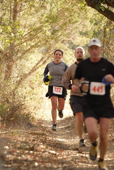 Beth Marek placed 5th in her age group in the 25K at the. Bandera 25K, 50K, and 100K trail race in Bandera, TX on Saturday, January 10, 2009.

Filename: SRM_20090110_09445065.jpg
Aperture: f/4.0
Shutter Speed: 1/320
Body: Canon EOS-1D Mark II
Lens: Canon EF 300mm f/2.8 L IS