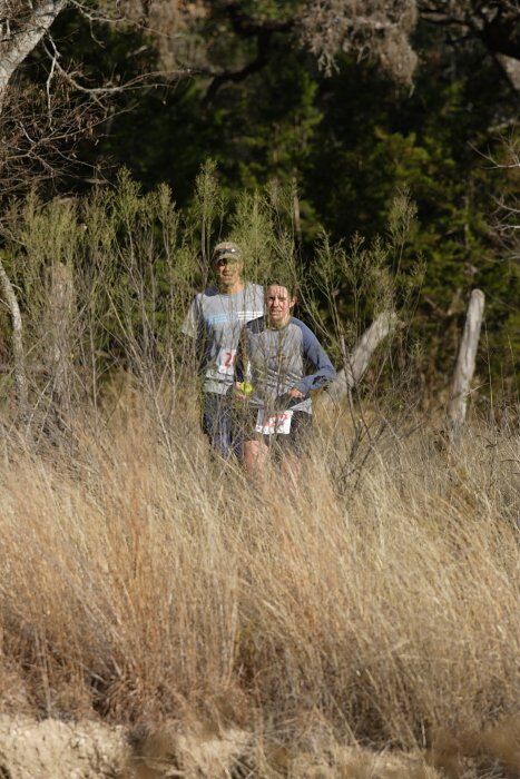 Beth Marek placed 5th in her age group in the 25K at the. Bandera 25K, 50K, and 100K trail race in Bandera, TX on Saturday, January 10, 2009.

Filename: SRM_20090110_10173087.jpg
Aperture: f/5.6
Shutter Speed: 1/640
Body: Canon EOS-1D Mark II
Lens: Canon EF 300mm f/2.8 L IS