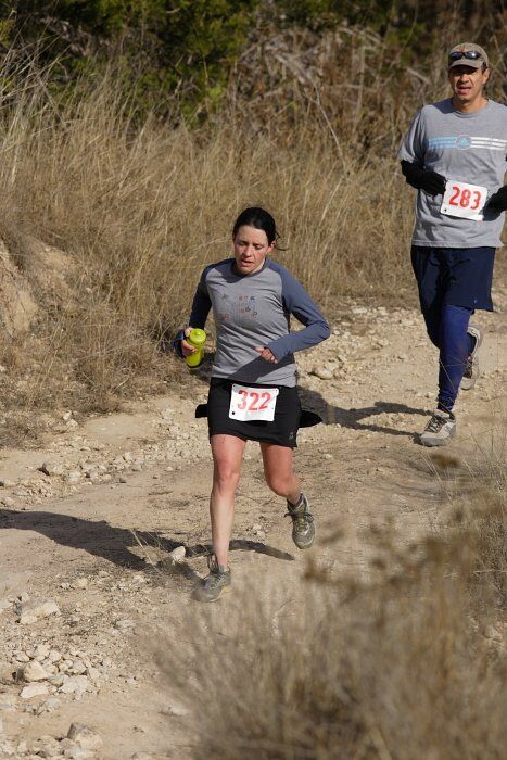 Beth Marek placed 5th in her age group in the 25K at the. Bandera 25K, 50K, and 100K trail race in Bandera, TX on Saturday, January 10, 2009.

Filename: SRM_20090110_10174292.jpg
Aperture: f/5.6
Shutter Speed: 1/1000
Body: Canon EOS-1D Mark II
Lens: Canon EF 300mm f/2.8 L IS