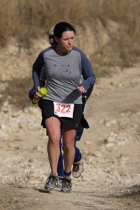 Beth Marek placed 5th in her age group in the 25K at the. Bandera 25K, 50K, and 100K trail race in Bandera, TX on Saturday, January 10, 2009.

Filename: SRM_20090110_10181407.jpg
Aperture: f/5.6
Shutter Speed: 1/800
Body: Canon EOS-1D Mark II
Lens: Canon EF 300mm f/2.8 L IS