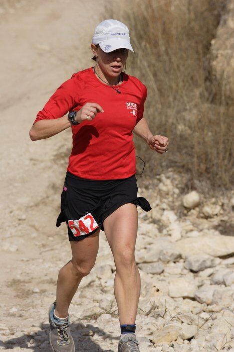 Meredith Terranova placed second overall in the 50K at the Bandera 25K, 50K, and 100K trail race in Bandera, TX on Saturday, January 10, 2009.

Filename: SRM_20090110_12423029.jpg
Aperture: f/5.6
Shutter Speed: 1/1000
Body: Canon EOS-1D Mark II
Lens: Canon EF 300mm f/2.8 L IS