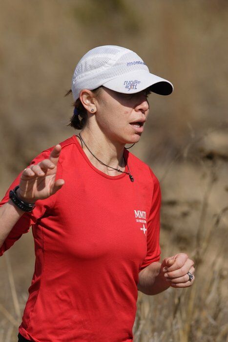 Meredith Terranova placed second overall in the 50K at the Bandera 25K, 50K, and 100K trail race in Bandera, TX on Saturday, January 10, 2009.

Filename: SRM_20090110_12424638.jpg
Aperture: f/5.6
Shutter Speed: 1/800
Body: Canon EOS-1D Mark II
Lens: Canon EF 300mm f/2.8 L IS