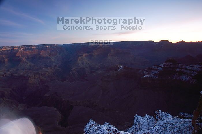 First sunrise of the new year at the south rim of the Grand Canyon, Thursday January 1, 2009.  The temperature was as low as 15 F the night before with a foot and a half of snow on the ground.  Luckily sunrise wasn't until 7:40.

Filename: SRM_20090101_07092888.JPG
Aperture: f/11.0
Shutter Speed: 30/1
Body: Canon EOS-1D Mark II
Lens: Canon EF 16-35mm f/2.8 L