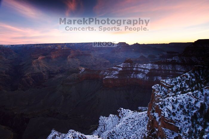 First sunrise of the new year at the south rim of the Grand Canyon, Thursday January 1, 2009.  The temperature was as low as 15 F the night before with a foot and a half of snow on the ground.  Luckily sunrise wasn't until 7:40.

Filename: SRM_20090101_07280399.JPG
Aperture: f/16.0
Shutter Speed: 4/1
Body: Canon EOS-1D Mark II
Lens: Canon EF 16-35mm f/2.8 L