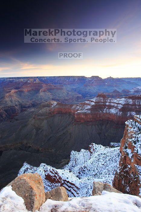 First sunrise of the new year at the south rim of the Grand Canyon, Thursday January 1, 2009.  The temperature was as low as 15 F the night before with a foot and a half of snow on the ground.  Luckily sunrise wasn't until 7:40.

Filename: SRM_20090101_07373008.JPG
Aperture: f/16.0
Shutter Speed: 25/10
Body: Canon EOS-1D Mark II
Lens: Canon EF 16-35mm f/2.8 L