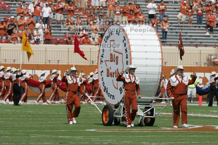 The UT marching band takes the field before the Arkansas football game.  The University of Texas football team defeated the Arkansas Razorbacks with a score of 52-10 in Austin, TX on Saturday, September 27, 2008.

Filename: SRM_20080927_14183210.jpg
Aperture: f/5.6
Shutter Speed: 1/2000
Body: Canon EOS-1D Mark II
Lens: Canon EF 300mm f/2.8 L IS