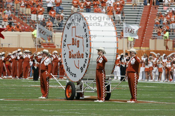 The UT marching band takes the field before the Arkansas football game.  The University of Texas football team defeated the Arkansas Razorbacks with a score of 52-10 in Austin, TX on Saturday, September 27, 2008.

Filename: SRM_20080927_14184611.jpg
Aperture: f/5.6
Shutter Speed: 1/2000
Body: Canon EOS-1D Mark II
Lens: Canon EF 300mm f/2.8 L IS