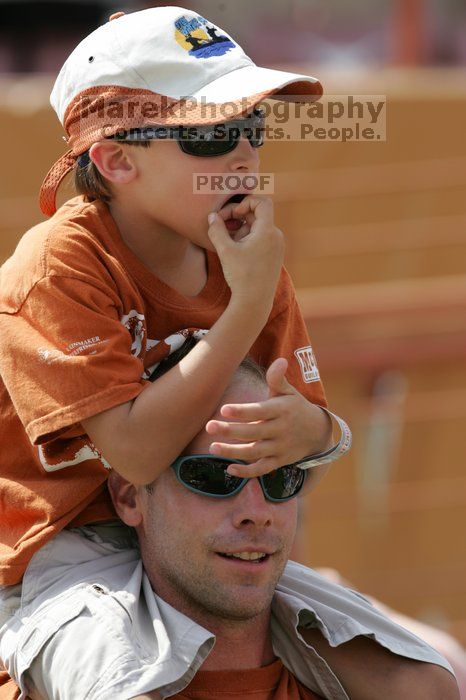 The University of Texas football team defeated the Arkansas Razorbacks with a score of 52-10 in Austin, TX on Saturday, September 27, 2008.

Filename: SRM_20080927_14261649.jpg
Aperture: f/5.0
Shutter Speed: 1/800
Body: Canon EOS-1D Mark II
Lens: Canon EF 300mm f/2.8 L IS