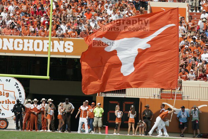 Texas Cheerleaders.  The University of Texas football team defeated the Arkansas Razorbacks with a score of 52-10 in Austin, TX on Saturday, September 27, 2008.

Filename: SRM_20080927_14425804.jpg
Aperture: f/5.6
Shutter Speed: 1/2500
Body: Canon EOS-1D Mark II
Lens: Canon EF 300mm f/2.8 L IS