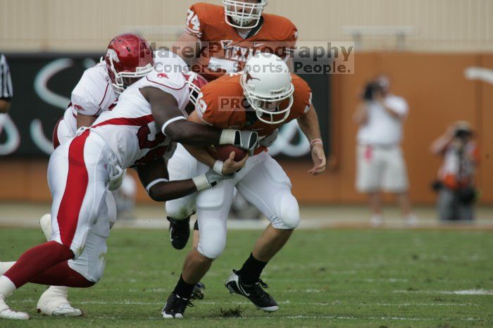 The University of Texas football team defeated the Arkansas Razorbacks with a score of 52-10 in Austin, TX on Saturday, September 27, 2008.

Filename: SRM_20080927_14553035.jpg
Aperture: f/5.6
Shutter Speed: 1/1000
Body: Canon EOS-1D Mark II
Lens: Canon EF 300mm f/2.8 L IS