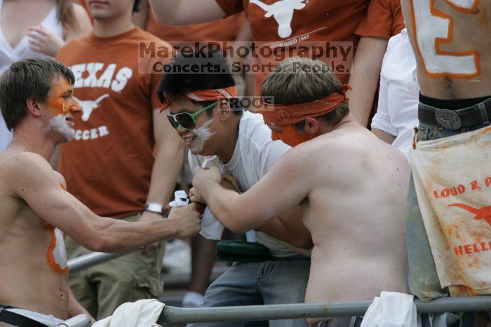 The University of Texas football team defeated the Arkansas Razorbacks with a score of 52-10 in Austin, TX on Saturday, September 27, 2008.

Filename: SRM_20080927_15023866.jpg
Aperture: f/5.0
Shutter Speed: 1/800
Body: Canon EOS-1D Mark II
Lens: Canon EF 300mm f/2.8 L IS