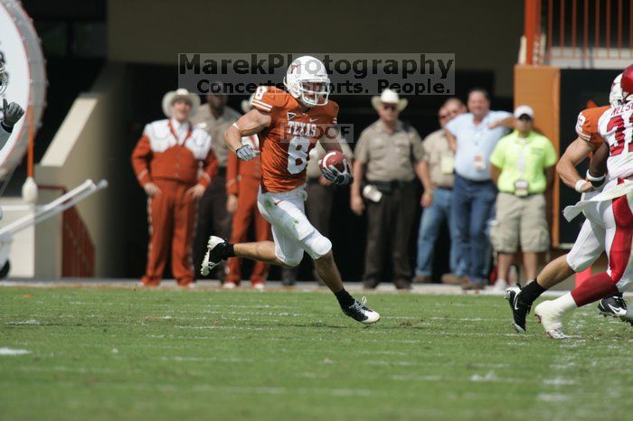 The University of Texas football team defeated the Arkansas Razorbacks with a score of 52-10 in Austin, TX on Saturday, September 27, 2008.

Filename: SRM_20080927_15090683.jpg
Aperture: f/5.6
Shutter Speed: 1/2000
Body: Canon EOS-1D Mark II
Lens: Canon EF 300mm f/2.8 L IS