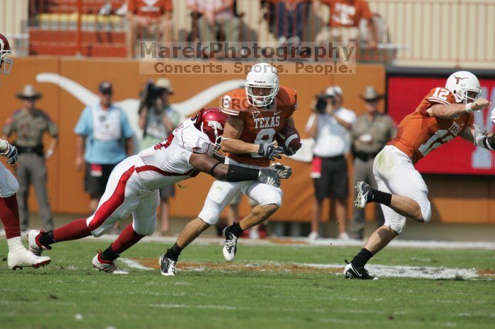 The University of Texas football team defeated the Arkansas Razorbacks with a score of 52-10 in Austin, TX on Saturday, September 27, 2008.

Filename: SRM_20080927_15090887.jpg
Aperture: f/5.6
Shutter Speed: 1/2000
Body: Canon EOS-1D Mark II
Lens: Canon EF 300mm f/2.8 L IS