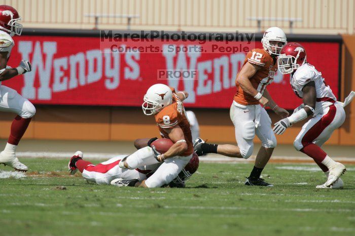 The University of Texas football team defeated the Arkansas Razorbacks with a score of 52-10 in Austin, TX on Saturday, September 27, 2008.

Filename: SRM_20080927_15091091.jpg
Aperture: f/5.6
Shutter Speed: 1/2000
Body: Canon EOS-1D Mark II
Lens: Canon EF 300mm f/2.8 L IS