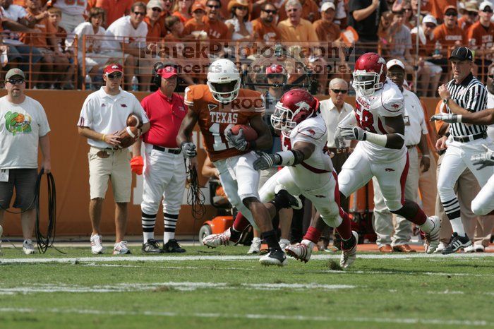 The University of Texas football team defeated the Arkansas Razorbacks with a score of 52-10 in Austin, TX on Saturday, September 27, 2008.

Filename: SRM_20080927_15121618.jpg
Aperture: f/5.6
Shutter Speed: 1/1600
Body: Canon EOS-1D Mark II
Lens: Canon EF 300mm f/2.8 L IS