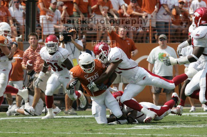 The University of Texas football team defeated the Arkansas Razorbacks with a score of 52-10 in Austin, TX on Saturday, September 27, 2008.

Filename: SRM_20080927_15121823.jpg
Aperture: f/5.6
Shutter Speed: 1/1250
Body: Canon EOS-1D Mark II
Lens: Canon EF 300mm f/2.8 L IS