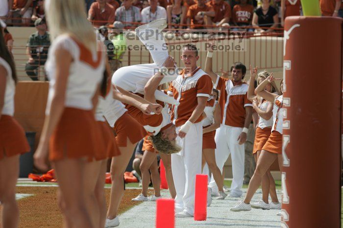 Texas Cheerleaders.  The University of Texas football team defeated the Arkansas Razorbacks with a score of 52-10 in Austin, TX on Saturday, September 27, 2008.

Filename: SRM_20080927_15182453.jpg
Aperture: f/6.3
Shutter Speed: 1/1250
Body: Canon EOS-1D Mark II
Lens: Canon EF 300mm f/2.8 L IS