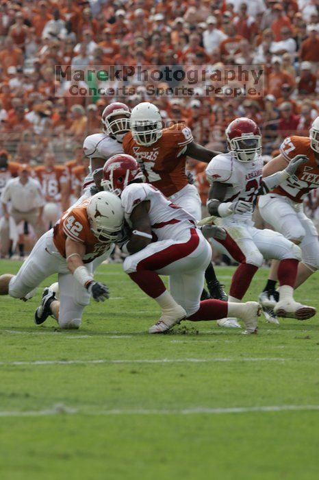 The University of Texas football team defeated the Arkansas Razorbacks with a score of 52-10 in Austin, TX on Saturday, September 27, 2008.

Filename: SRM_20080927_15191268.jpg
Aperture: f/6.3
Shutter Speed: 1/800
Body: Canon EOS-1D Mark II
Lens: Canon EF 300mm f/2.8 L IS