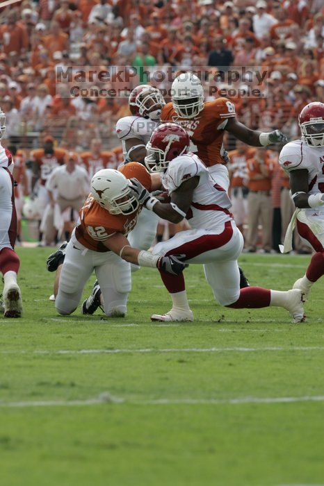 The University of Texas football team defeated the Arkansas Razorbacks with a score of 52-10 in Austin, TX on Saturday, September 27, 2008.

Filename: SRM_20080927_15191469.jpg
Aperture: f/6.3
Shutter Speed: 1/640
Body: Canon EOS-1D Mark II
Lens: Canon EF 300mm f/2.8 L IS