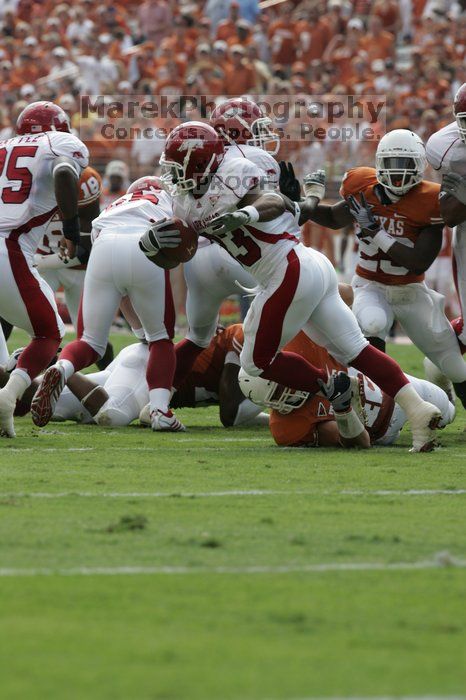 The University of Texas football team defeated the Arkansas Razorbacks with a score of 52-10 in Austin, TX on Saturday, September 27, 2008.

Filename: SRM_20080927_15191676.jpg
Aperture: f/6.3
Shutter Speed: 1/640
Body: Canon EOS-1D Mark II
Lens: Canon EF 300mm f/2.8 L IS