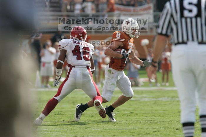 The University of Texas football team defeated the Arkansas Razorbacks with a score of 52-10 in Austin, TX on Saturday, September 27, 2008.

Filename: SRM_20080927_15353238.jpg
Aperture: f/5.6
Shutter Speed: 1/1250
Body: Canon EOS-1D Mark II
Lens: Canon EF 300mm f/2.8 L IS