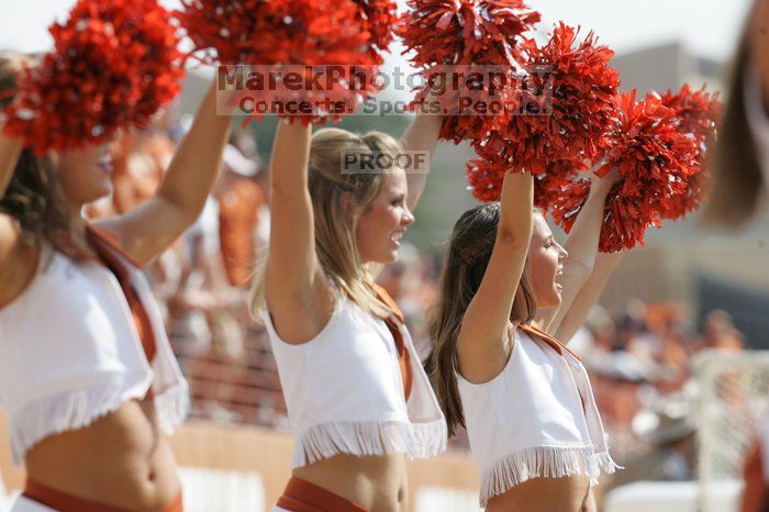 Texas Pom.  The University of Texas football team defeated the Arkansas Razorbacks with a score of 52-10 in Austin, TX on Saturday, September 27, 2008.

Filename: SRM_20080927_15380463.jpg
Aperture: f/5.6
Shutter Speed: 1/1250
Body: Canon EOS-1D Mark II
Lens: Canon EF 300mm f/2.8 L IS