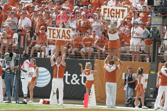 Texas Cheerleaders.  The University of Texas football team defeated the Arkansas Razorbacks with a score of 52-10 in Austin, TX on Saturday, September 27, 2008.

Filename: SRM_20080927_15381667.jpg
Aperture: f/5.6
Shutter Speed: 1/1000
Body: Canon EOS-1D Mark II
Lens: Canon EF 300mm f/2.8 L IS