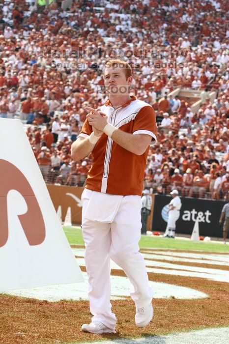 Texas Cheerleaders.  The University of Texas football team defeated the Arkansas Razorbacks with a score of 52-10 in Austin, TX on Saturday, September 27, 2008.

Filename: SRM_20080927_15393871.jpg
Aperture: f/5.6
Shutter Speed: 1/1250
Body: Canon EOS 20D
Lens: Canon EF 80-200mm f/2.8 L