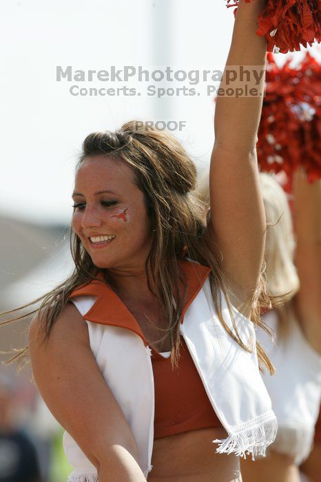 Texas Pom.  The University of Texas football team defeated the Arkansas Razorbacks with a score of 52-10 in Austin, TX on Saturday, September 27, 2008.

Filename: SRM_20080927_15405483.jpg
Aperture: f/5.6
Shutter Speed: 1/1250
Body: Canon EOS-1D Mark II
Lens: Canon EF 300mm f/2.8 L IS