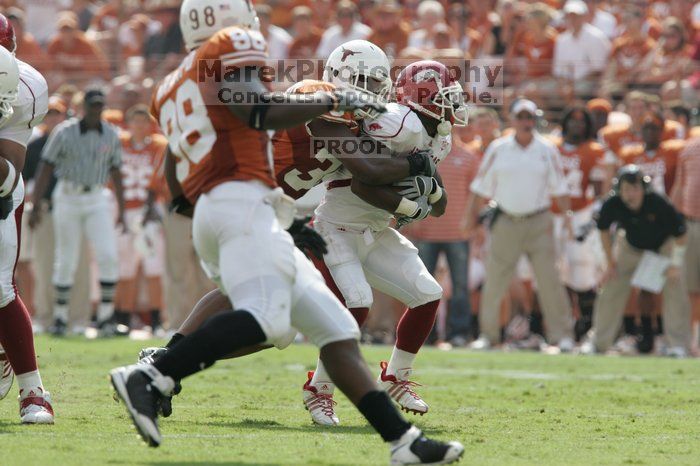 The University of Texas football team defeated the Arkansas Razorbacks with a score of 52-10 in Austin, TX on Saturday, September 27, 2008.

Filename: SRM_20080927_15431090.jpg
Aperture: f/5.6
Shutter Speed: 1/1000
Body: Canon EOS-1D Mark II
Lens: Canon EF 300mm f/2.8 L IS